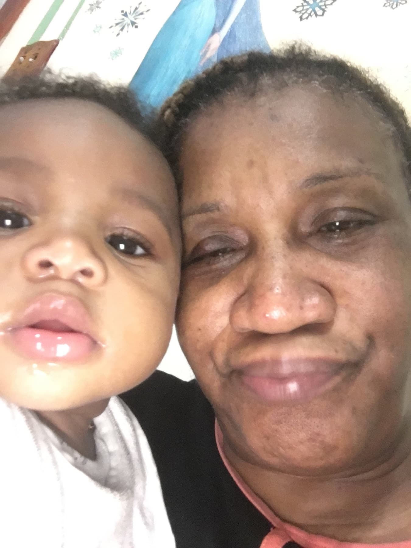 Caregiver and infant photographed together